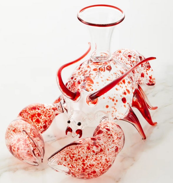 A blown glass sculpture of a lobster that also can be used as a decanter. It has legs and enormous claws. No one would actually try to serve wine out of this thing, I refuse to believe it.