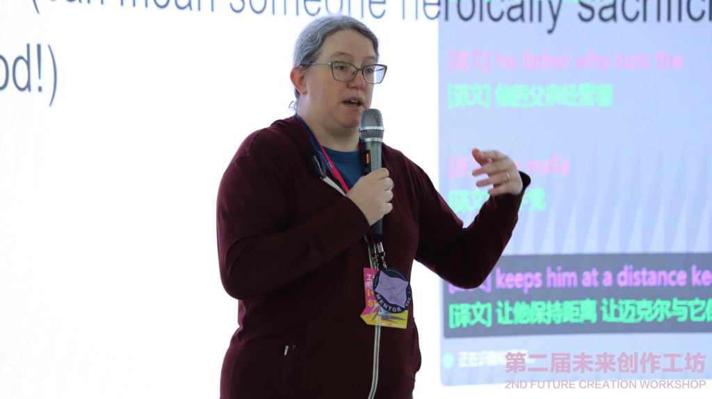 A picture of me, discoursing. In the background you can see one of my ugly slides, overlaid with a projection of speech being transcribed in English and then translated into Chinese, as subtitles.